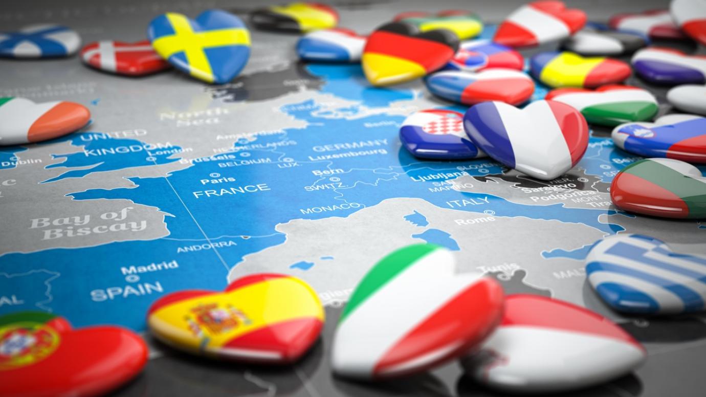 Heartshaped badges with EU country flags on a map